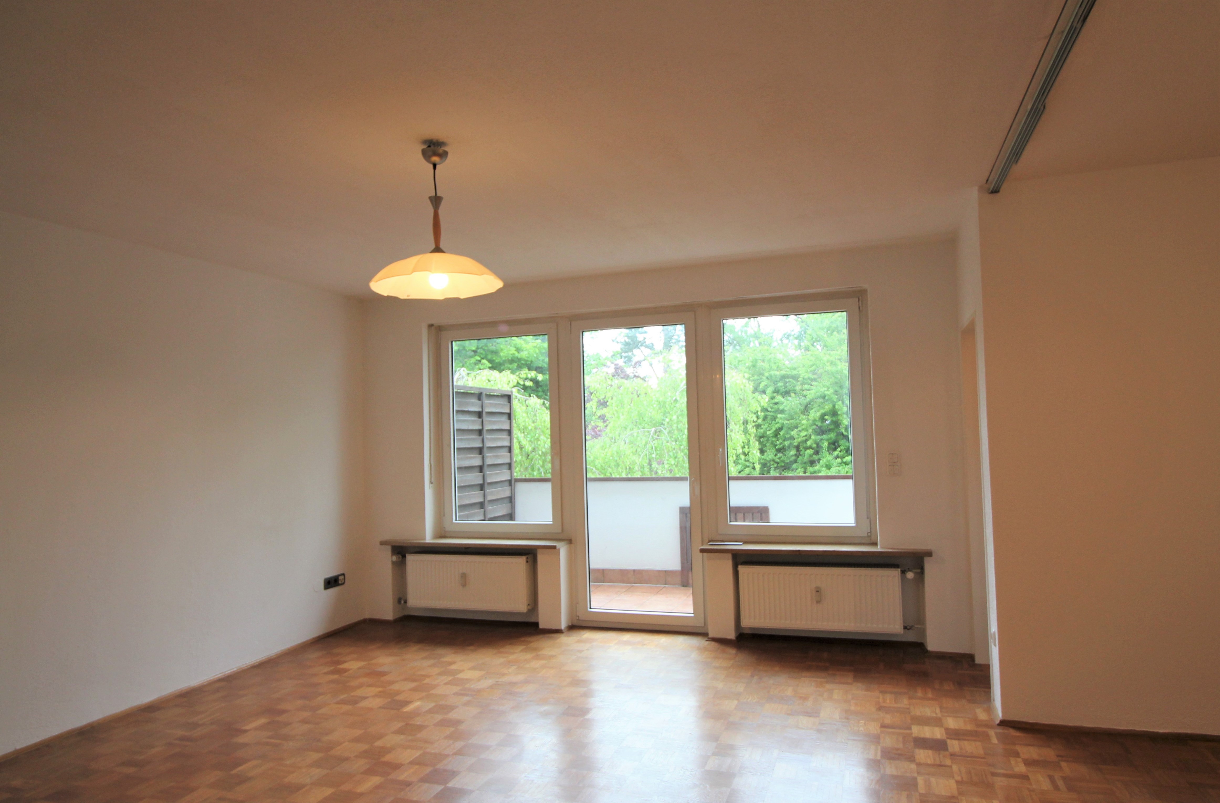 Blick ins Grüne: Gut geschnittene 1-Zimmer-Wohnung mit Südbalkon